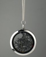 Amulet with black moss
